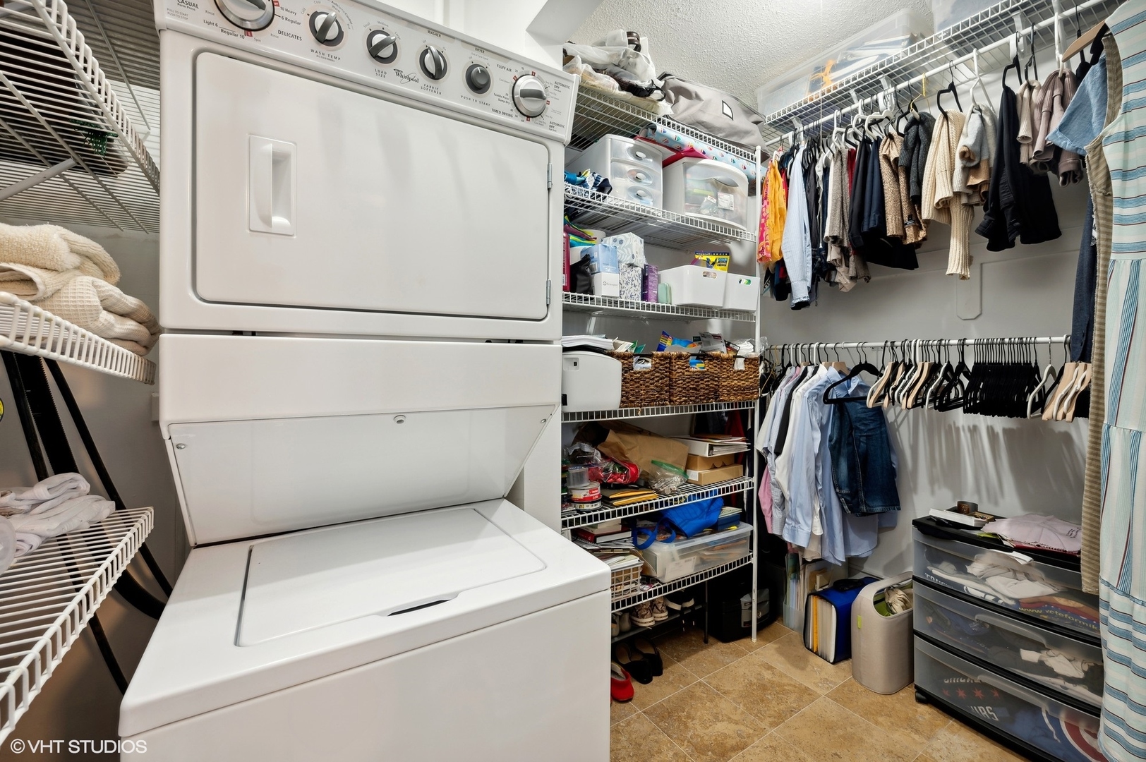 725 West Sheridan Road, Unit 603 Chicago, IL 60613 - Photo 13 of 16 a view of walk in closet with clothes and shoes