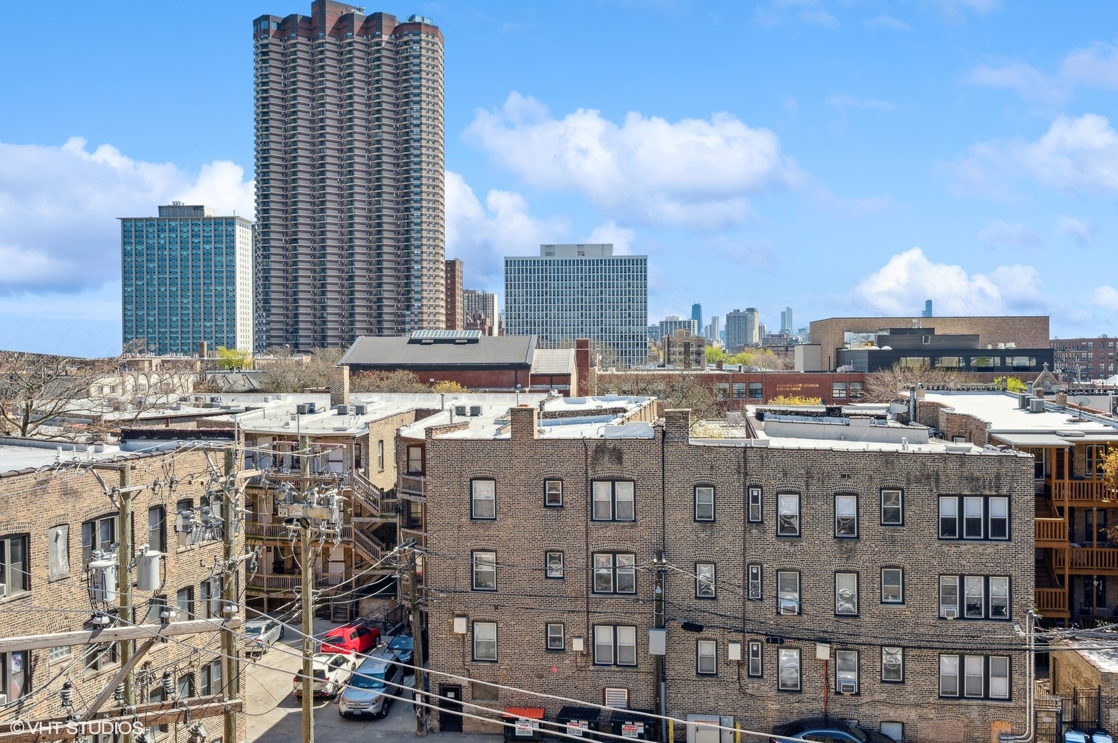 725 West Sheridan Road, Unit 603 Chicago, IL 60613 - Photo 15 of 16 a view of a city with tall buildings