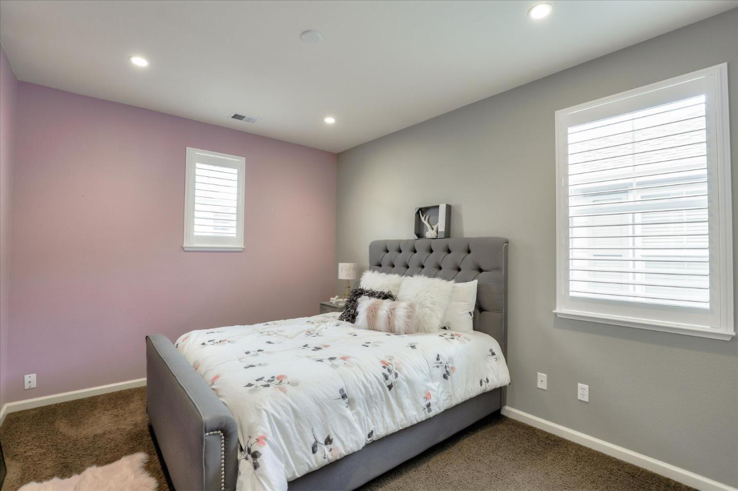 7820 Dickens Way Gilroy, CA 95020 - Photo 19 of 27 a bedroom with a bed and a window