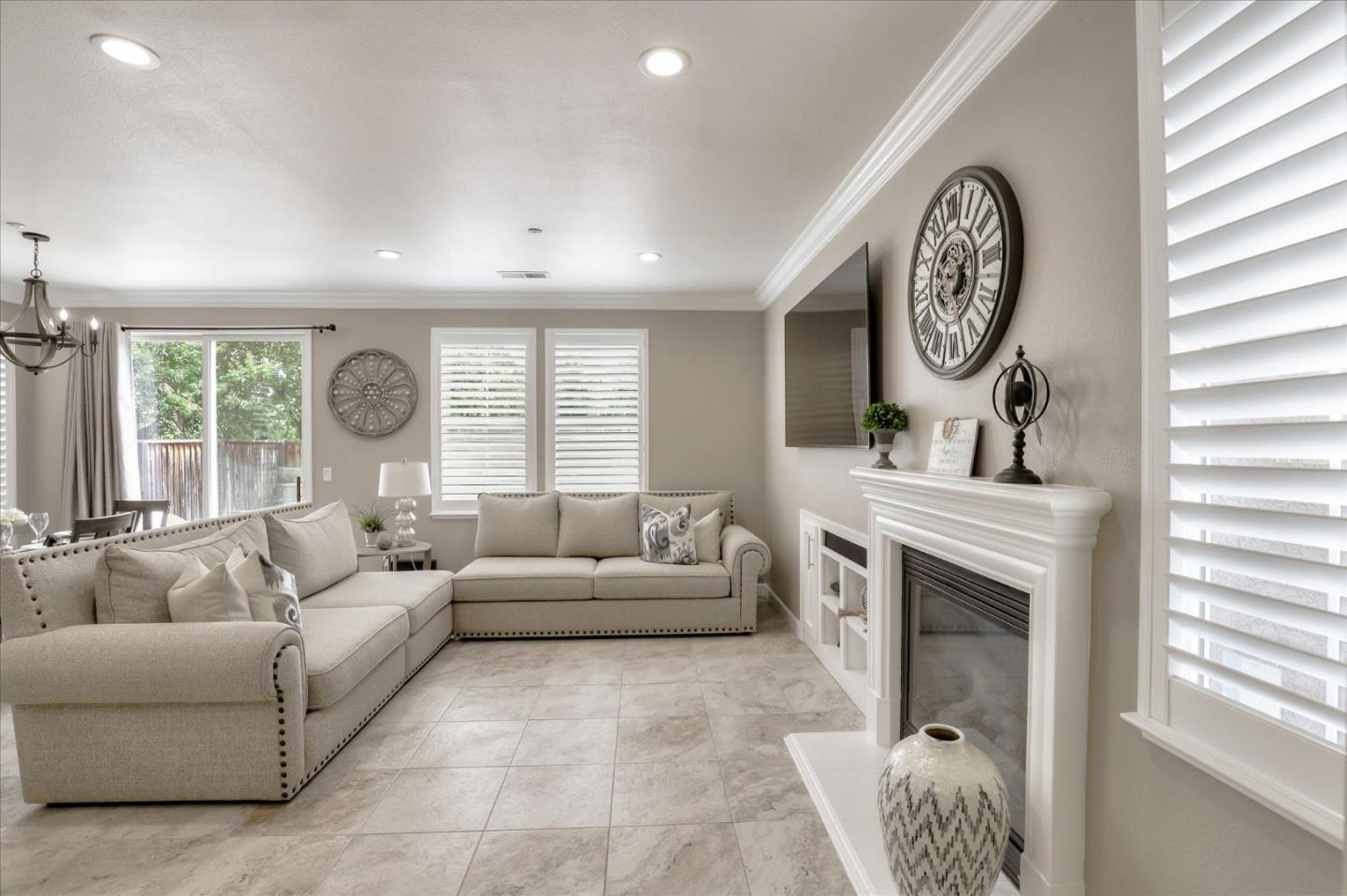 7820 Dickens Way Gilroy, CA 95020 - Photo 5 of 27 a living room with furniture and a fireplace