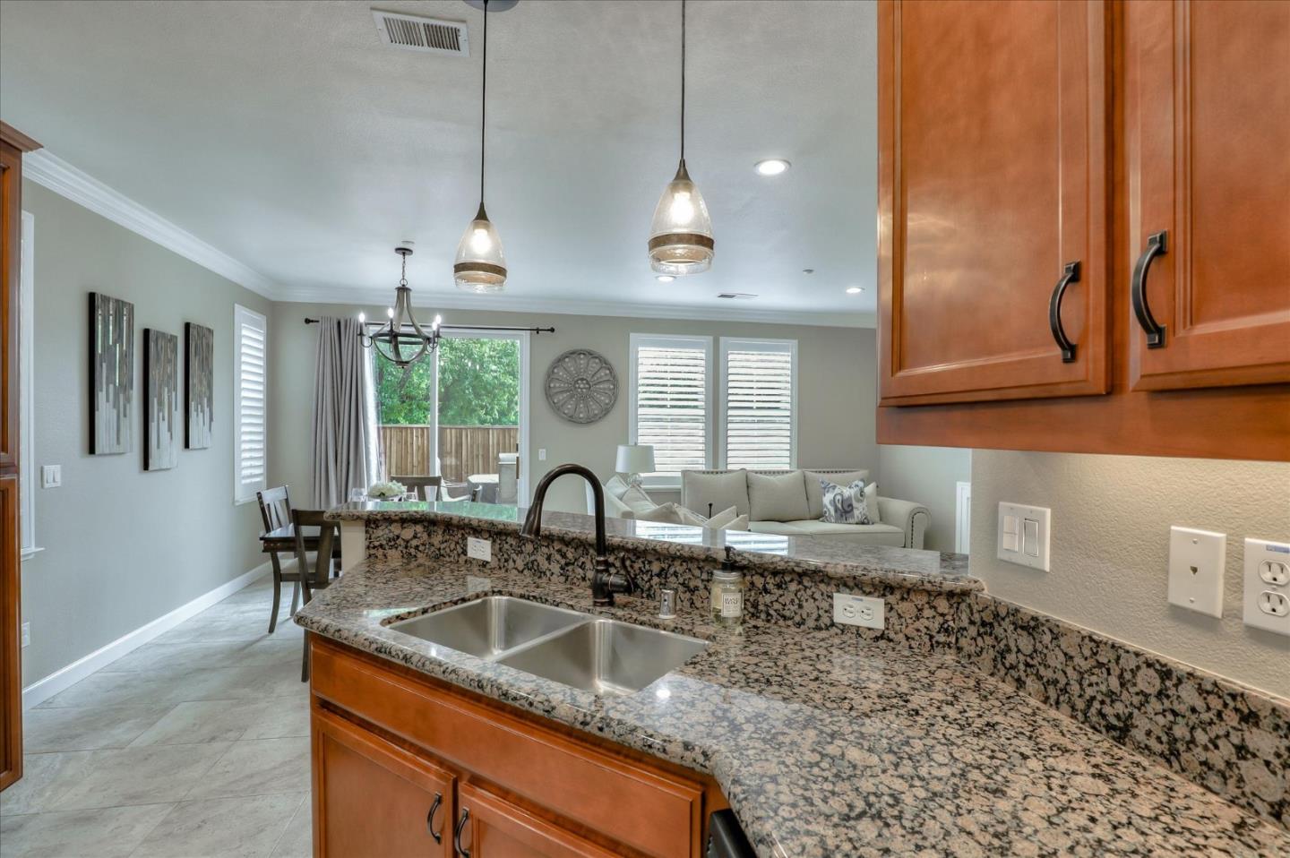 7820 Dickens Way Gilroy, CA 95020 - Photo 10 of 27 a kitchen with a sink a counter space and cabinets