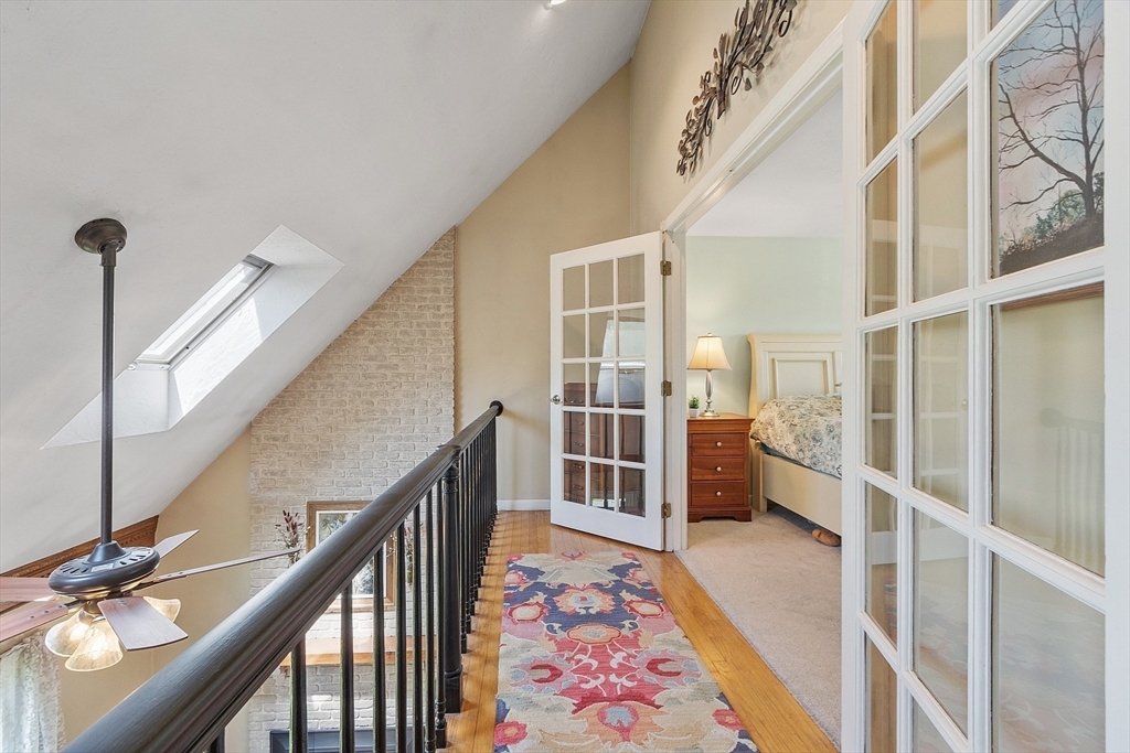 3 Sycamore Drive Rutland, MA 01543 - Photo 25 of 42 a view of an entryway with stairs and wooden floor
