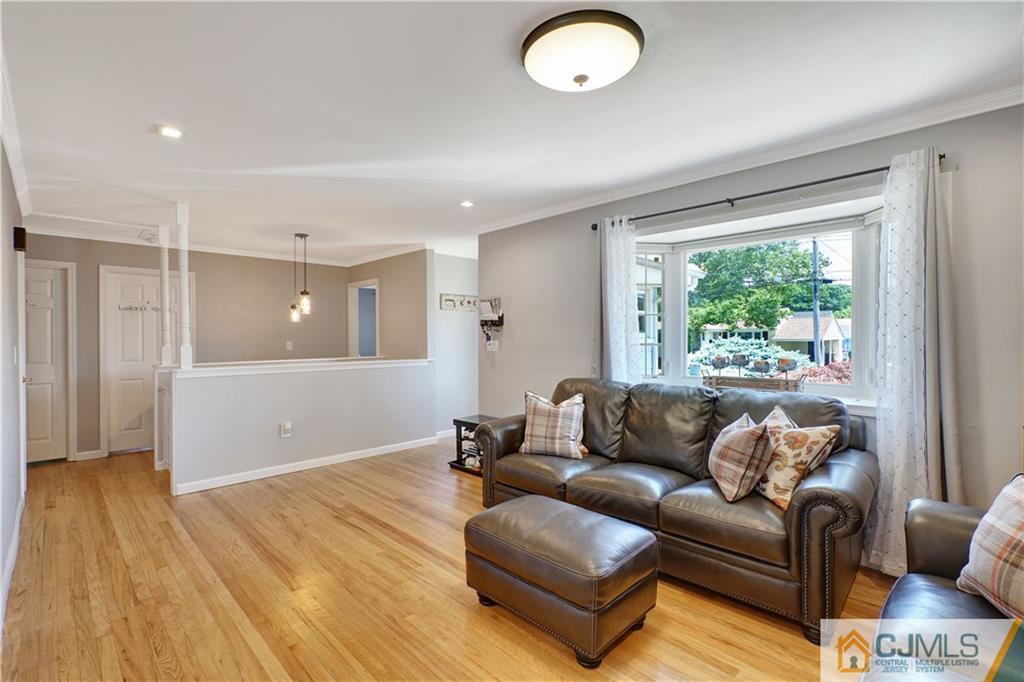 34 Mercer Road Old Bridge, NJ 08857 - Photo 3 of 27 a living room with furniture and a large window