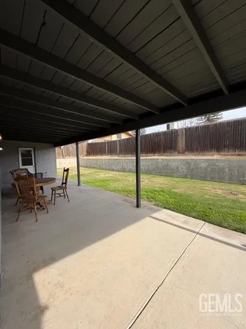 a view of a backyard of a house