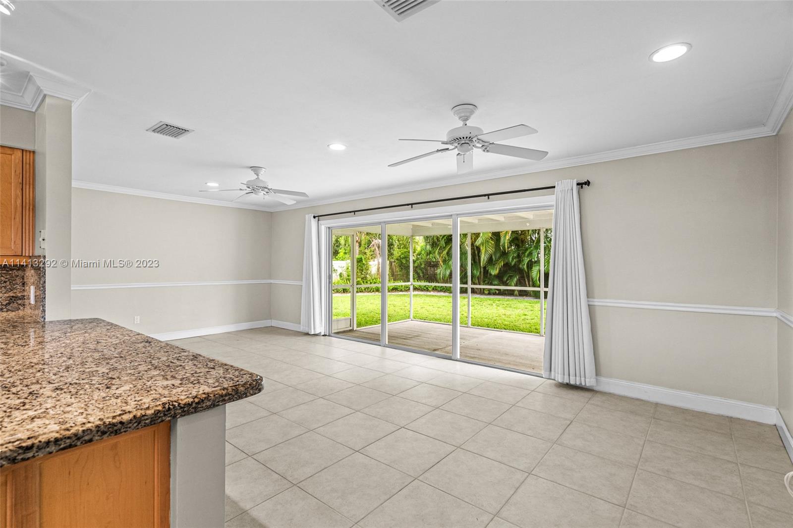 1260 Southwest 9th Street Boca Raton, FL 33486 - Photo 11 of 40 a view of an empty room with a window