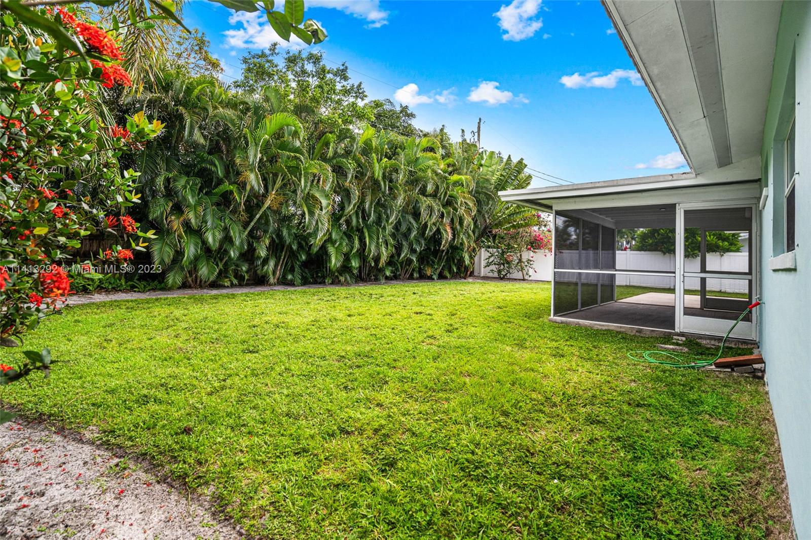 1260 Southwest 9th Street Boca Raton, FL 33486 - Photo 30 of 40 a view of a backyard with garden