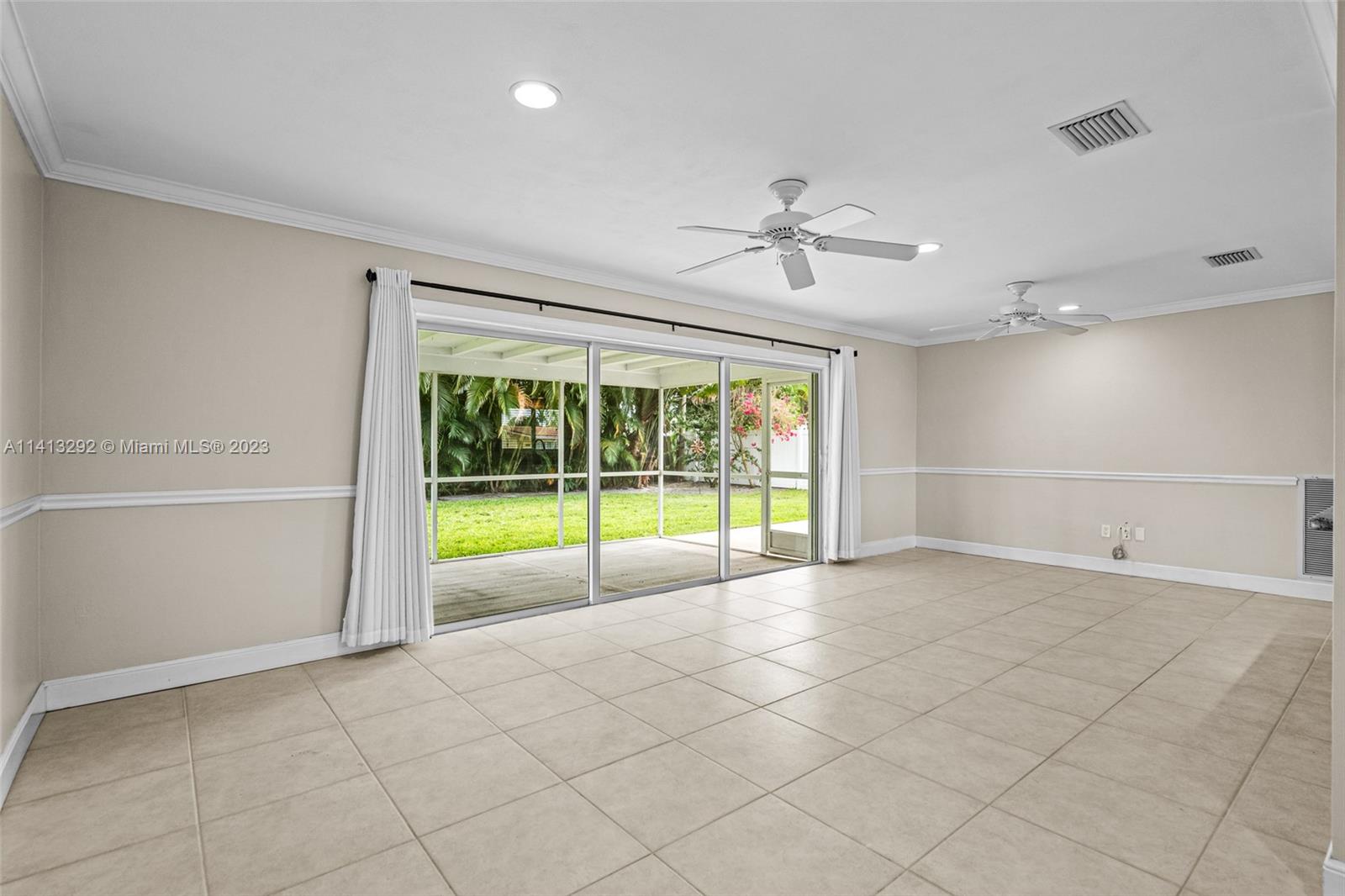 1260 Southwest 9th Street Boca Raton, FL 33486 - Photo 3 of 40 a view of an empty room with a window