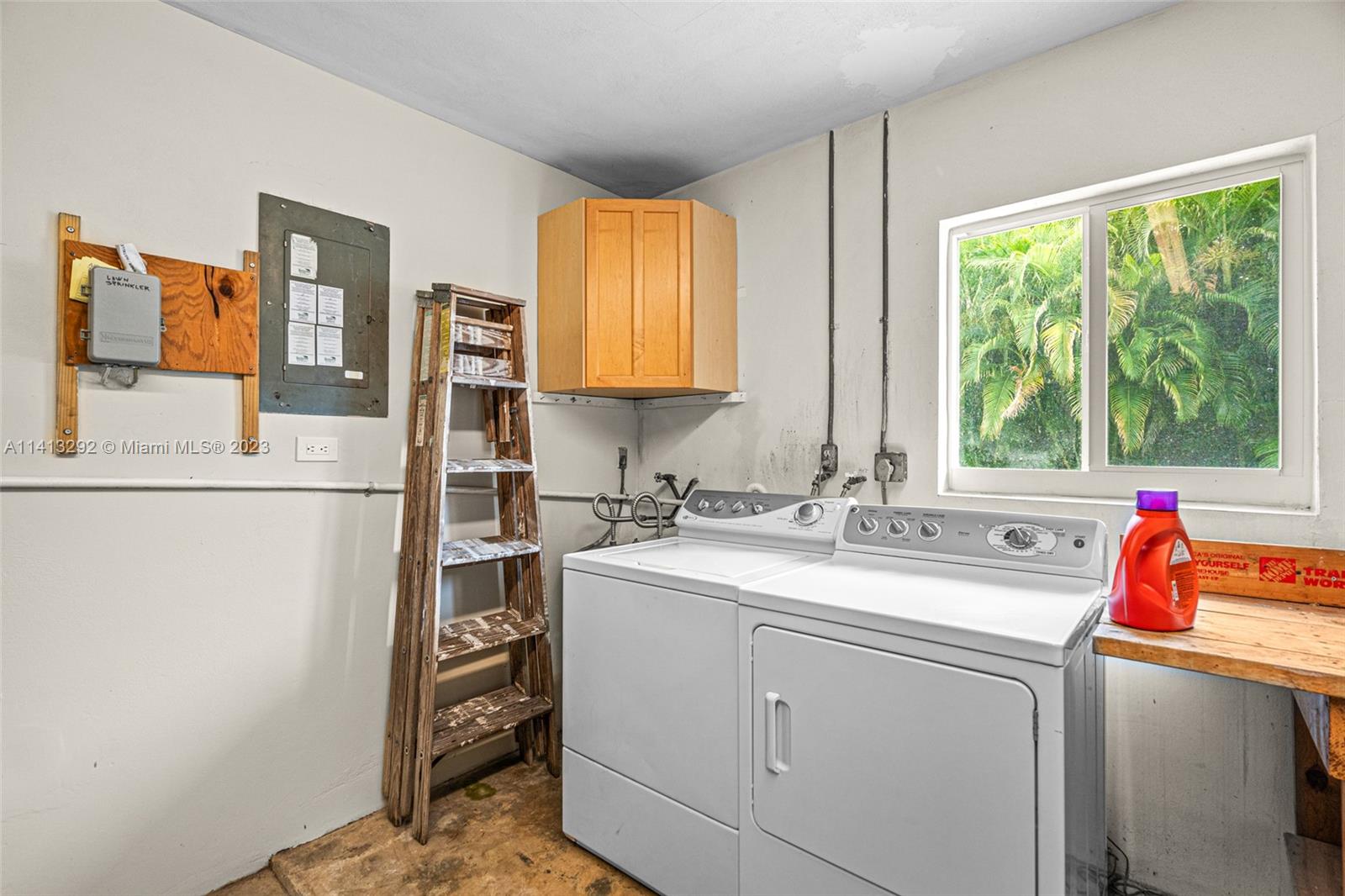 1260 Southwest 9th Street Boca Raton, FL 33486 - Photo 33 of 40 a utility room with dryer and washer