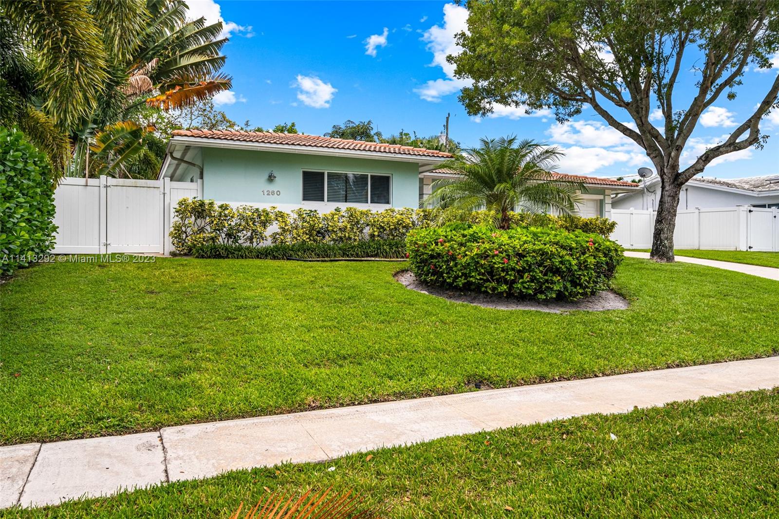 1260 Southwest 9th Street Boca Raton, FL 33486 - Photo 36 of 40 a view of a house with a garden