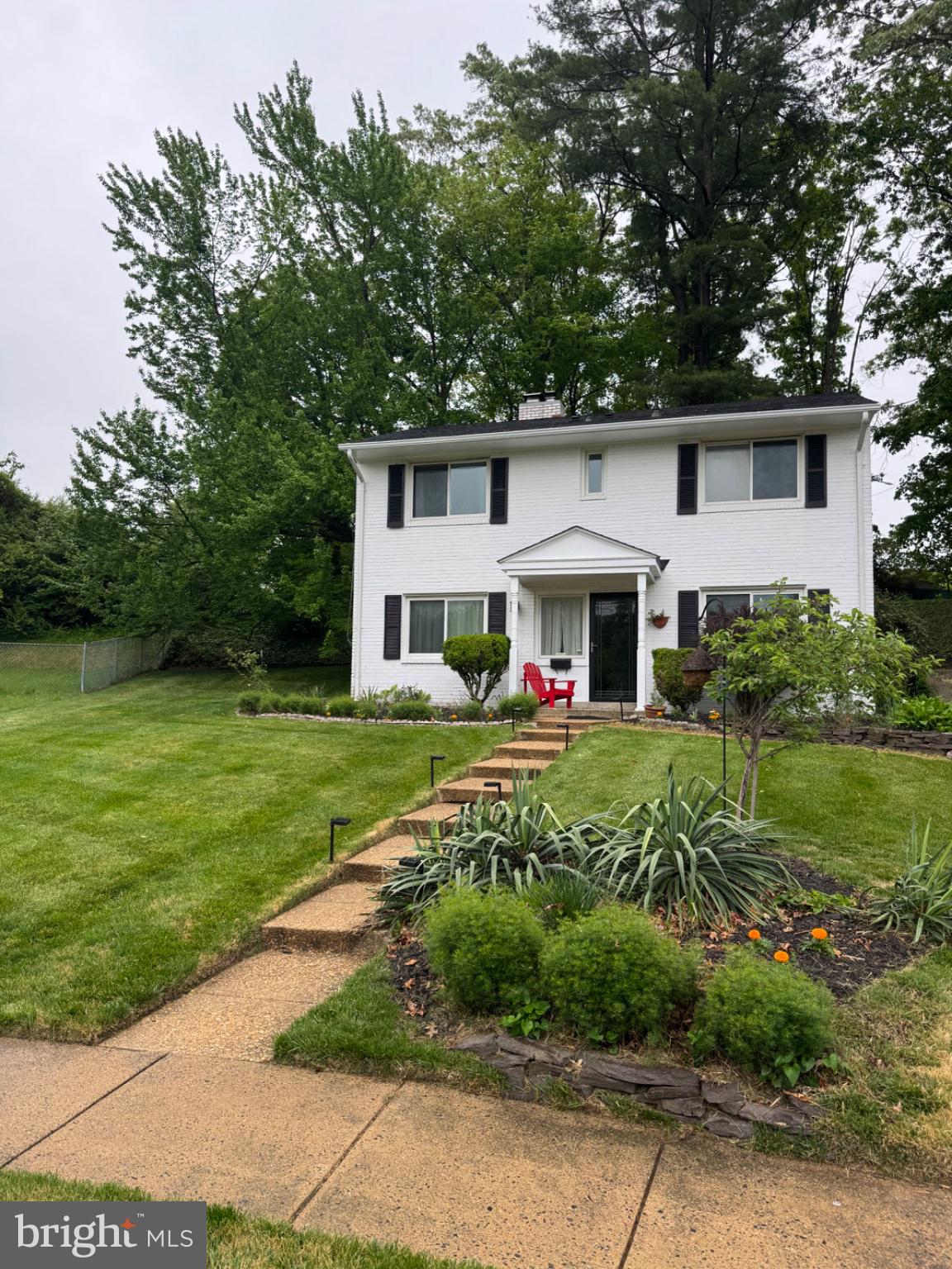 5512 Kathleen Place Springfield, VA 22151 - Photo 2 of 3 Charming home with lush greenery.