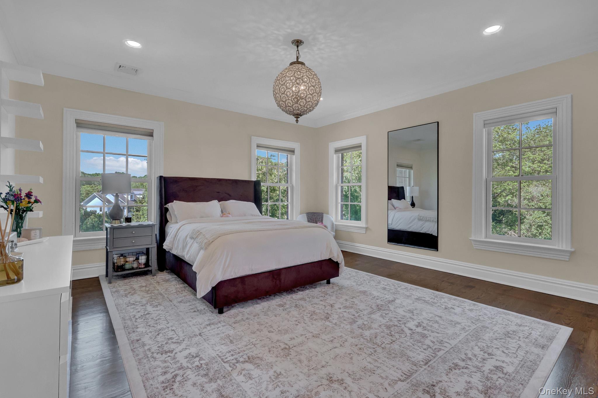 36 Old Field Road Setauket, NY 11733 - Photo 35 of 42 a spacious bedroom with a bed and a window