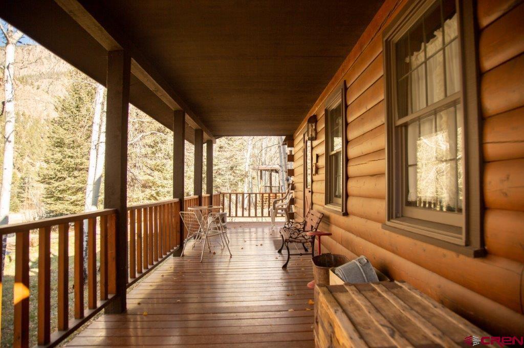 231 Forest Road Creede, CO 81130 - Photo 3 of 31 a view of entryway with wooden floor