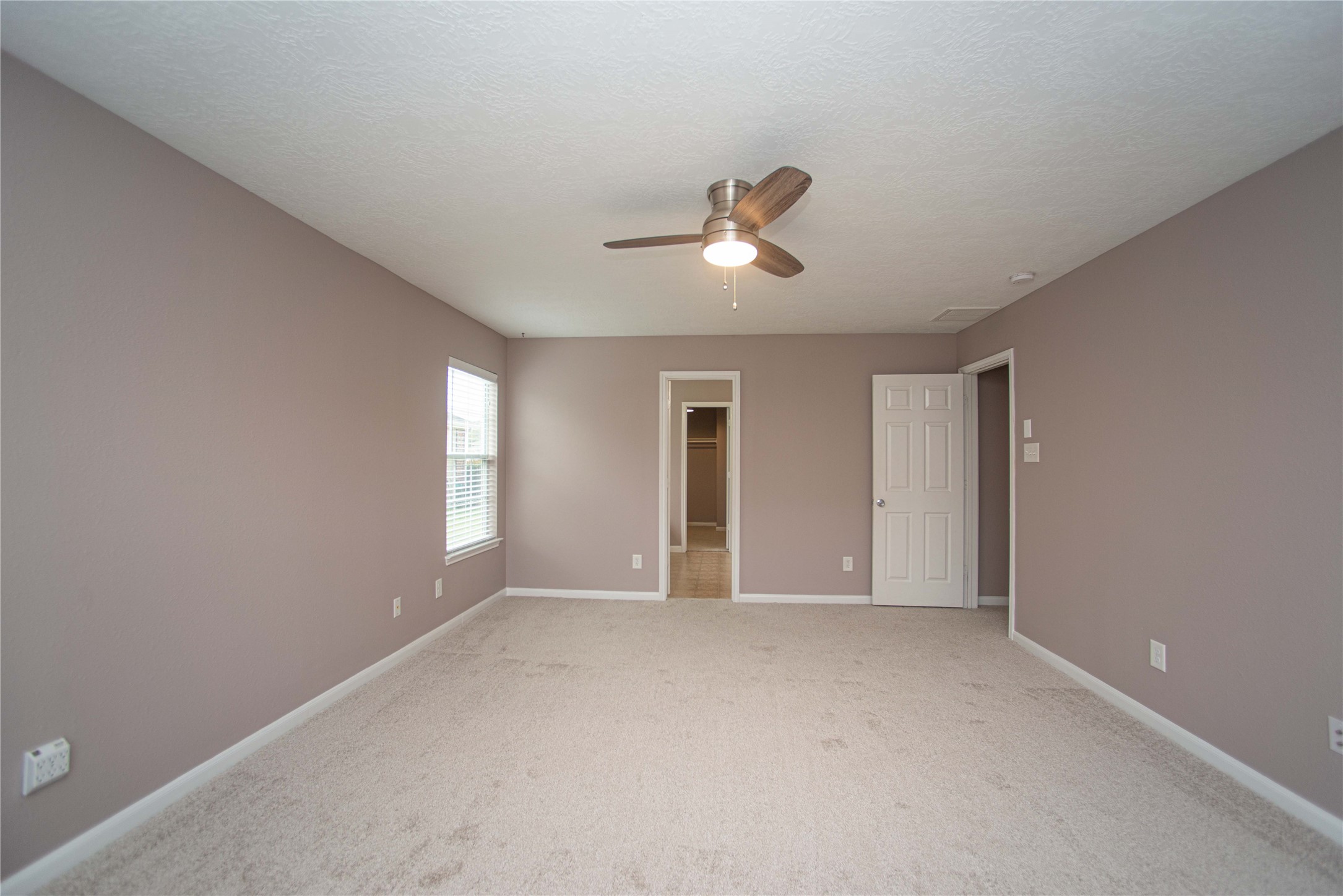 29314 Legends Bluff Drive Spring, TX 77386 - Photo 12 of 26 a view of empty room with windows
