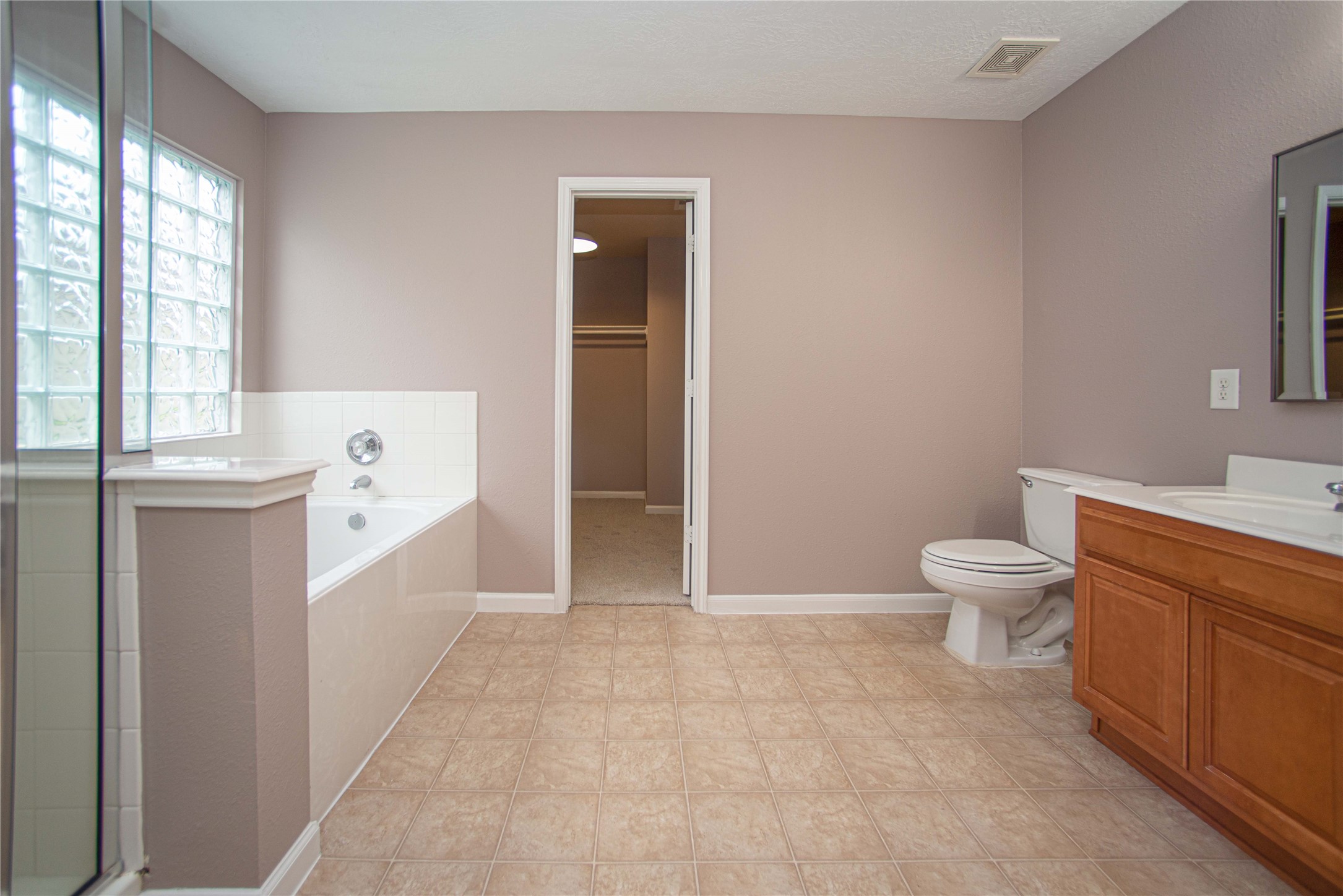 29314 Legends Bluff Drive Spring, TX 77386 - Photo 15 of 26 a bathroom with a sink a toilet and shower