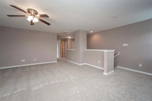 a view of a hallway with closet