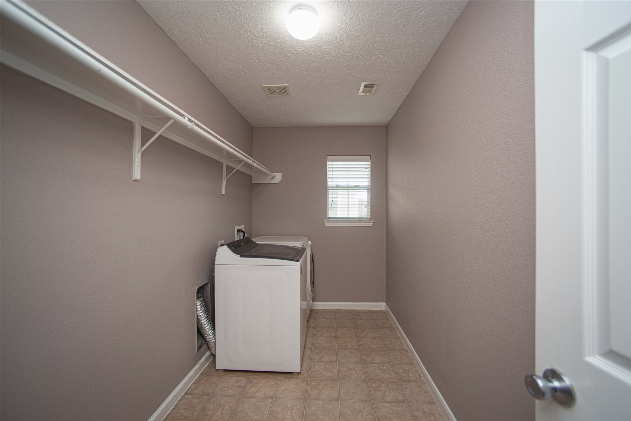 29314 Legends Bluff Drive Spring, TX 77386 - Photo 20 of 26 a view of a hallway with closet