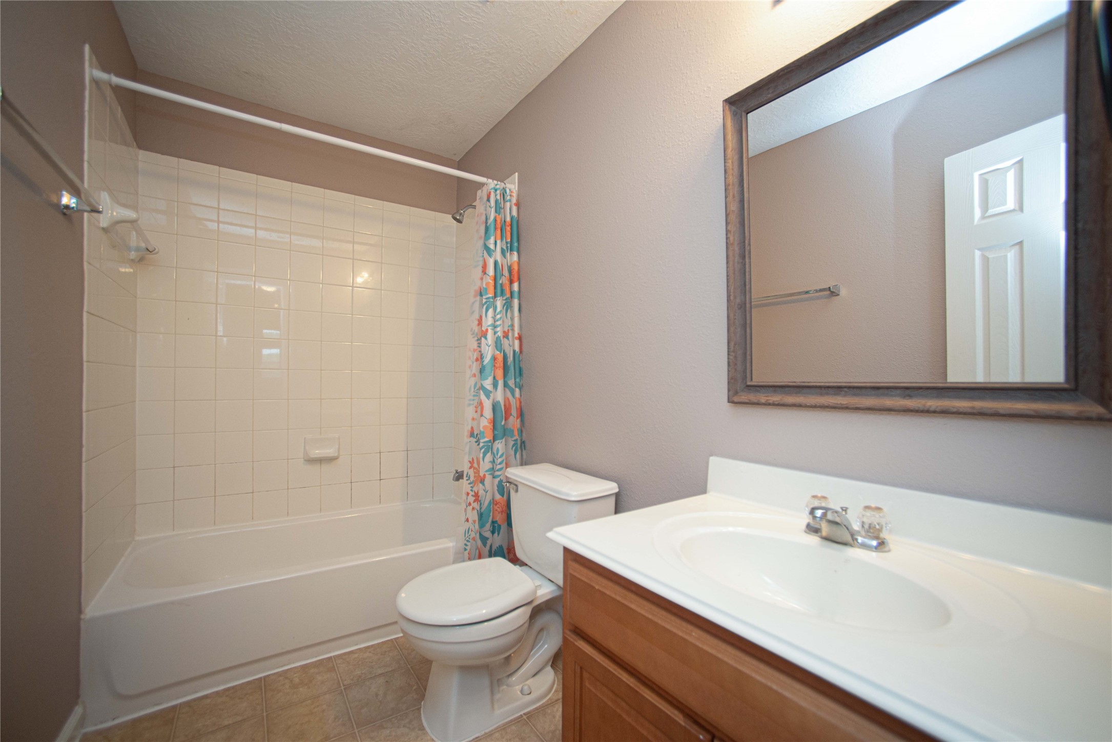 29314 Legends Bluff Drive Spring, TX 77386 - Photo 22 of 26 a bathroom with a sink a toilet and shower