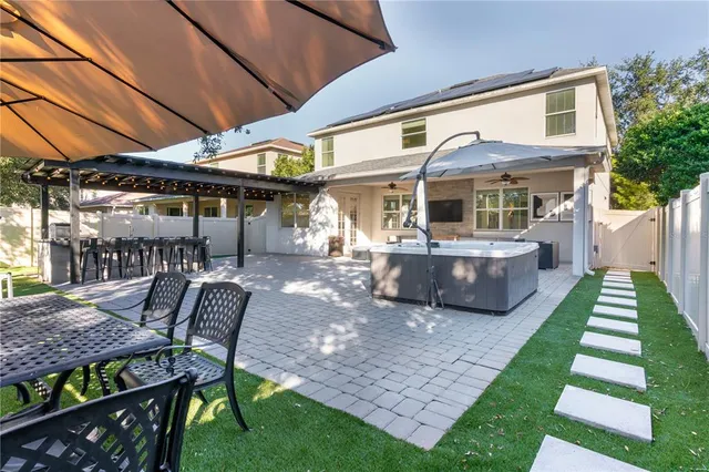 a room with wooden floors table tennis and window
