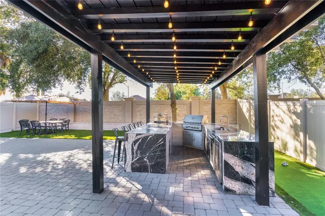 a living room with a flat screen tv and a couch