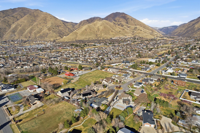 145 Carnesecca Court Mapleton, UT 84664 - Photo 105 of 109 Aerial perspective of suburban area with mountains