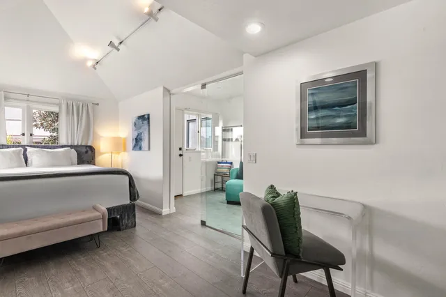 a bedroom with a bed and furniture