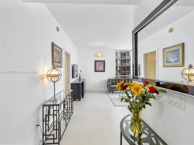 a view of a livingroom with furniture and a livingroom