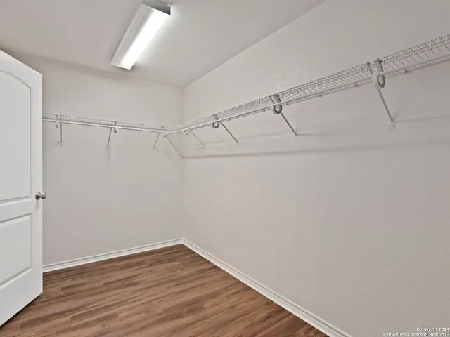 a view of a house with a yard and wooden roof