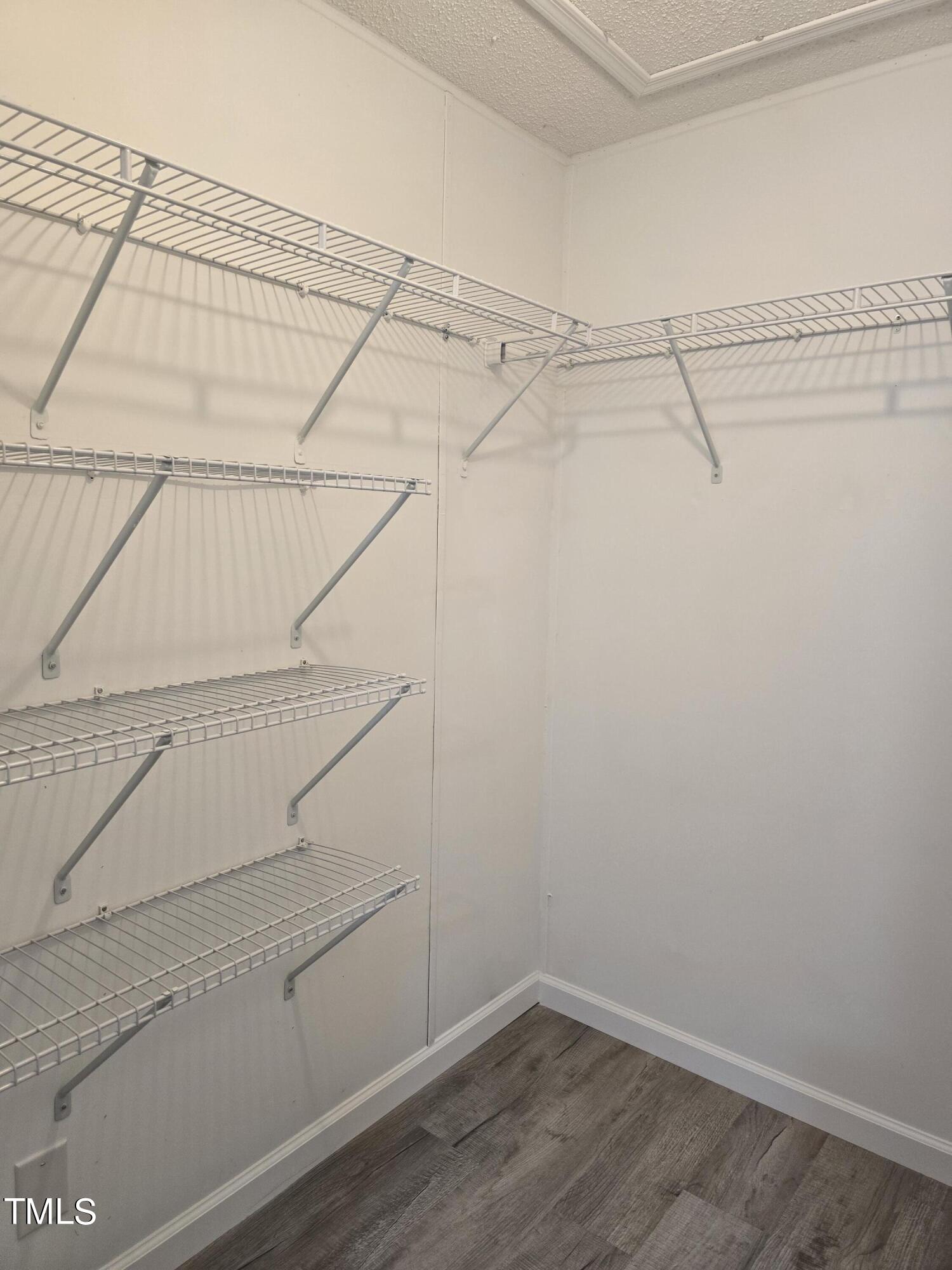 1096 Worthville Road Randleman, NC 27317 - Photo 13 of 20 a view of a room with racks on the wall