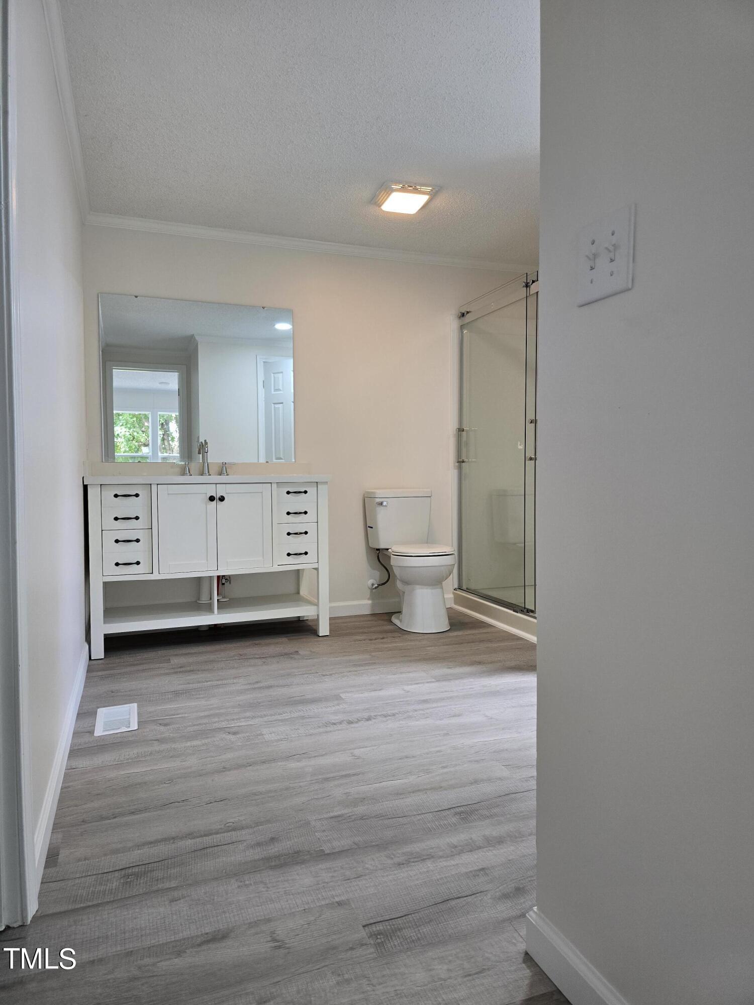 1096 Worthville Road Randleman, NC 27317 - Photo 14 of 20 a view of a room with wooden floor
