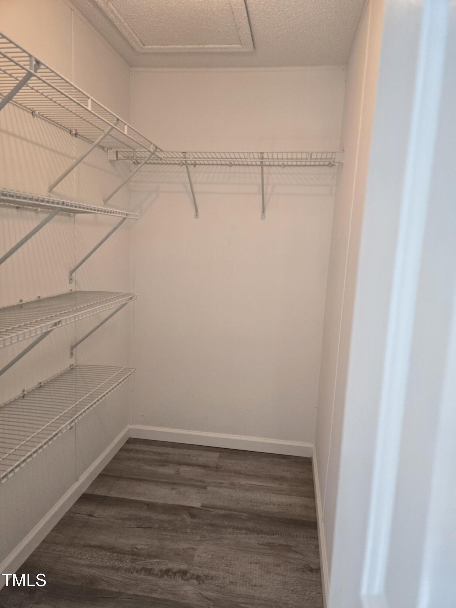 1096 Worthville Road Randleman, NC 27317 - Photo 19 of 20 a view of a room with racks on the wall