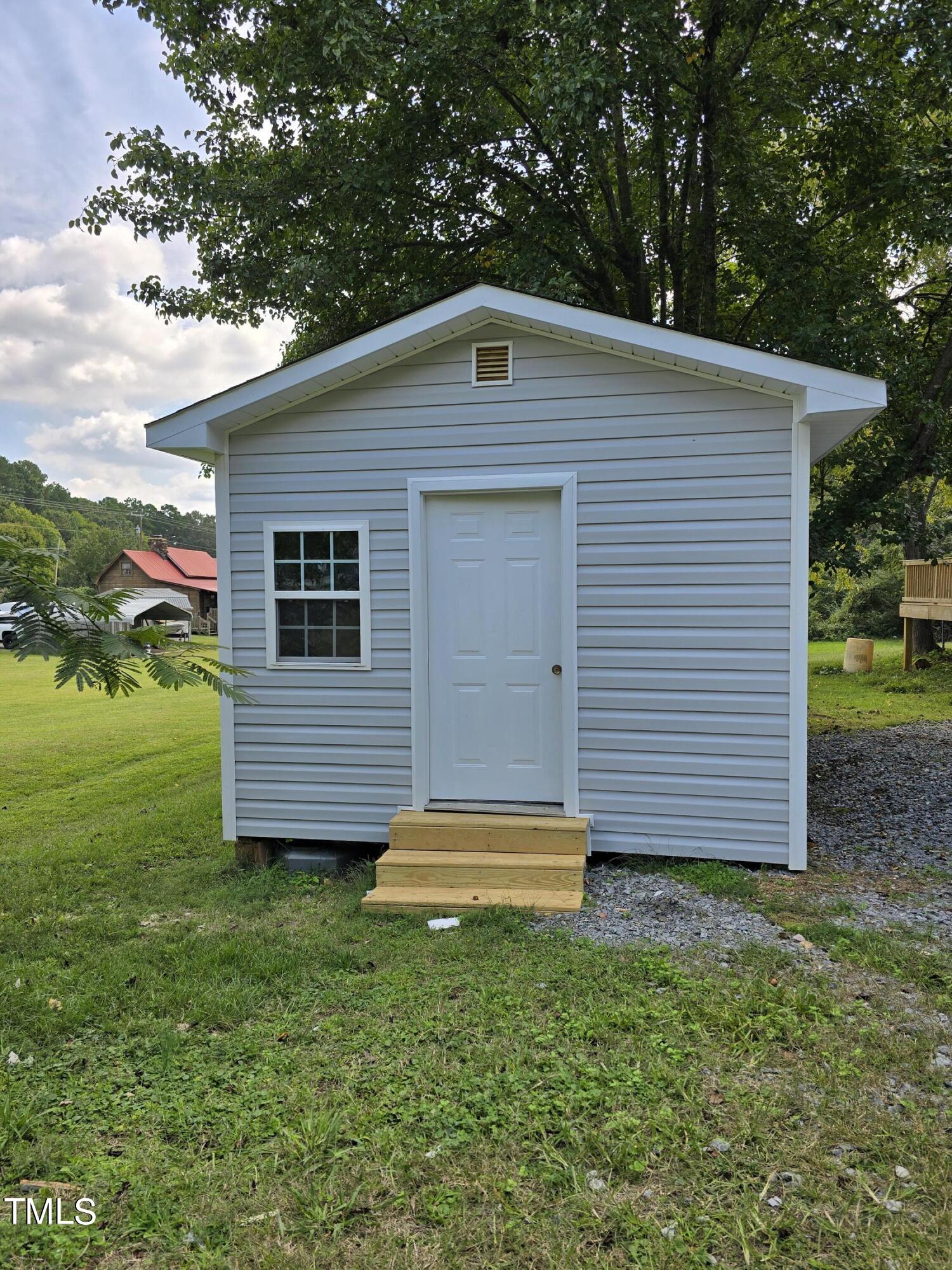 1096 Worthville Road Randleman, NC 27317 - Photo 20 of 20 a front view of house with garden