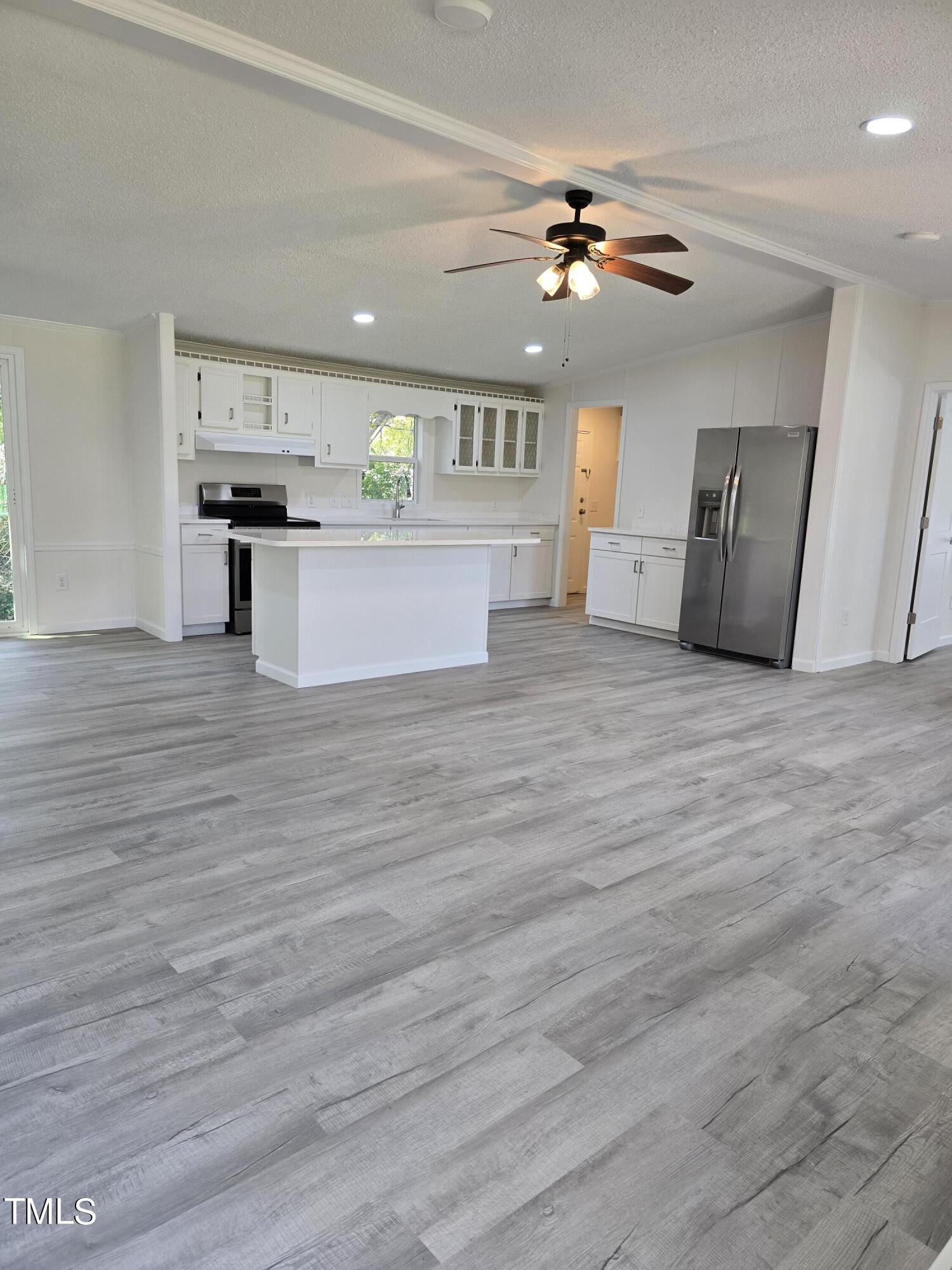1096 Worthville Road Randleman, NC 27317 - Photo 7 of 20 a view of a kitchen with a sink and cabinet