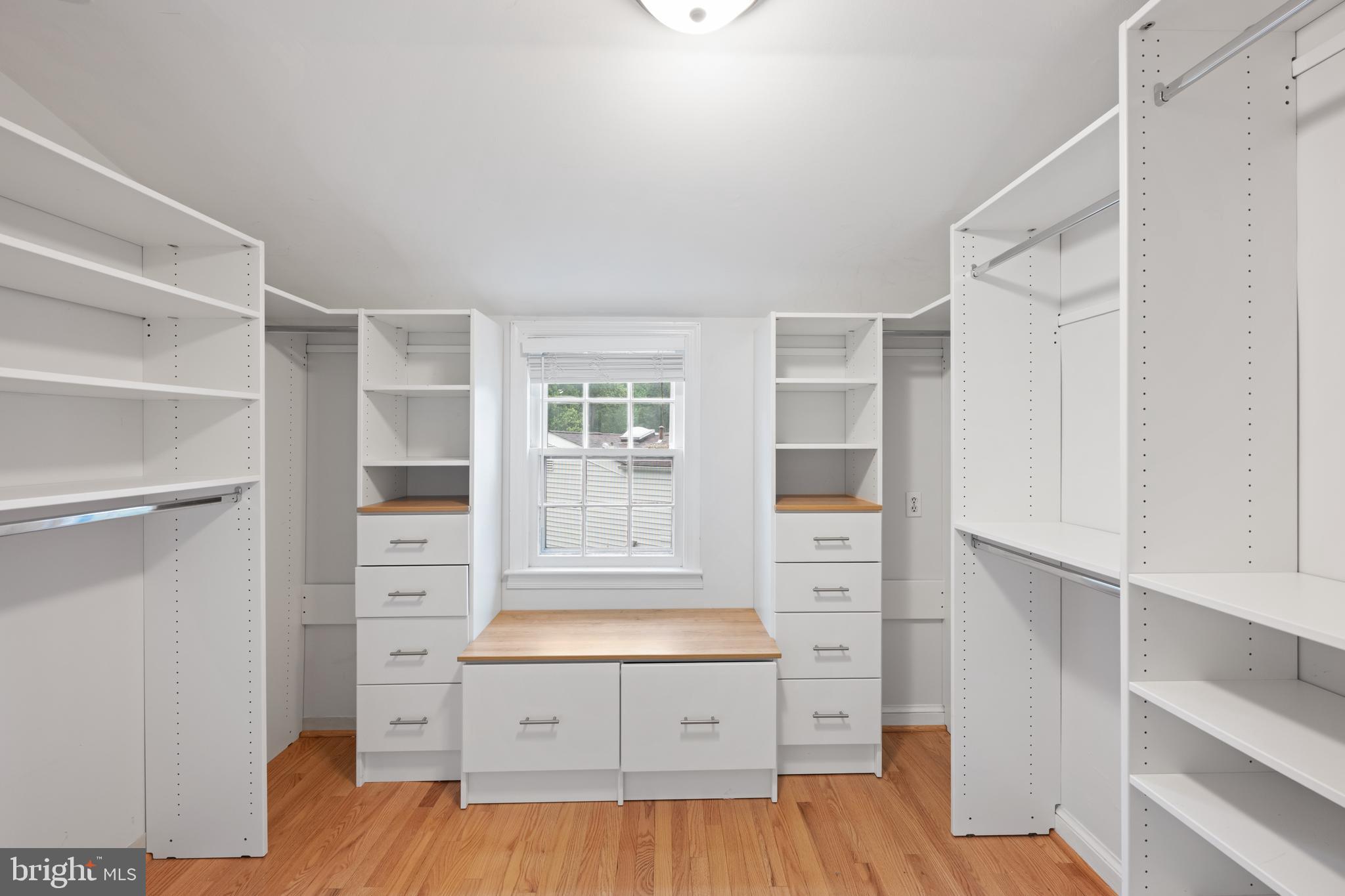 403 East Melbourne Avenue Silver Spring, MD 20901 - Photo 17 of 33 a view of walk in closet with empty racks