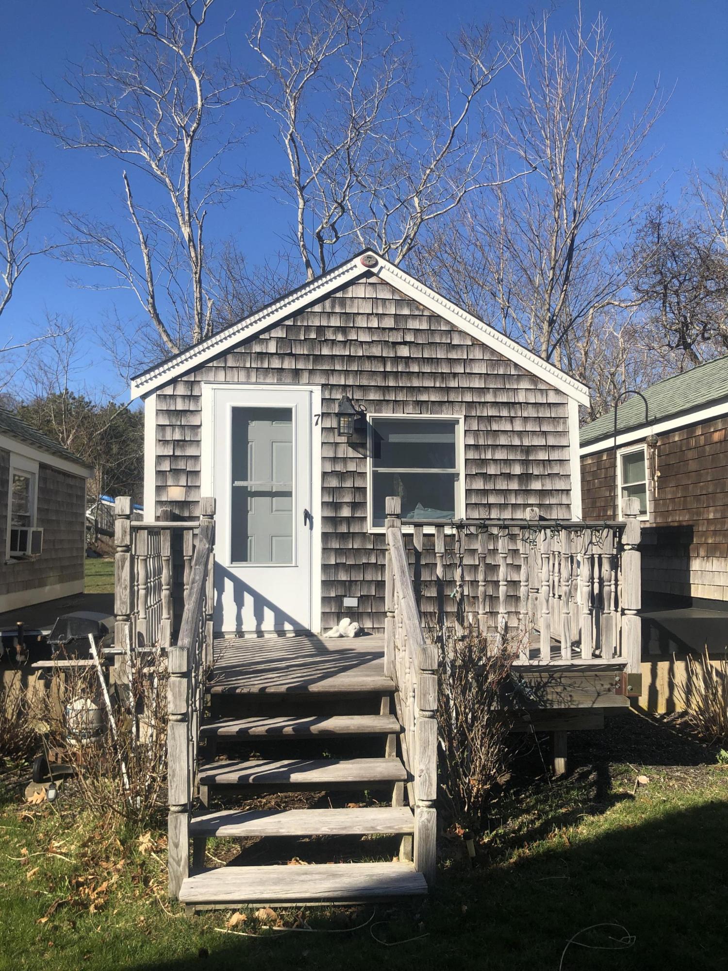17 Shore Road, Unit 7 Truro, MA 02666 - Photo 3 of 11 a front view of a house with stairs