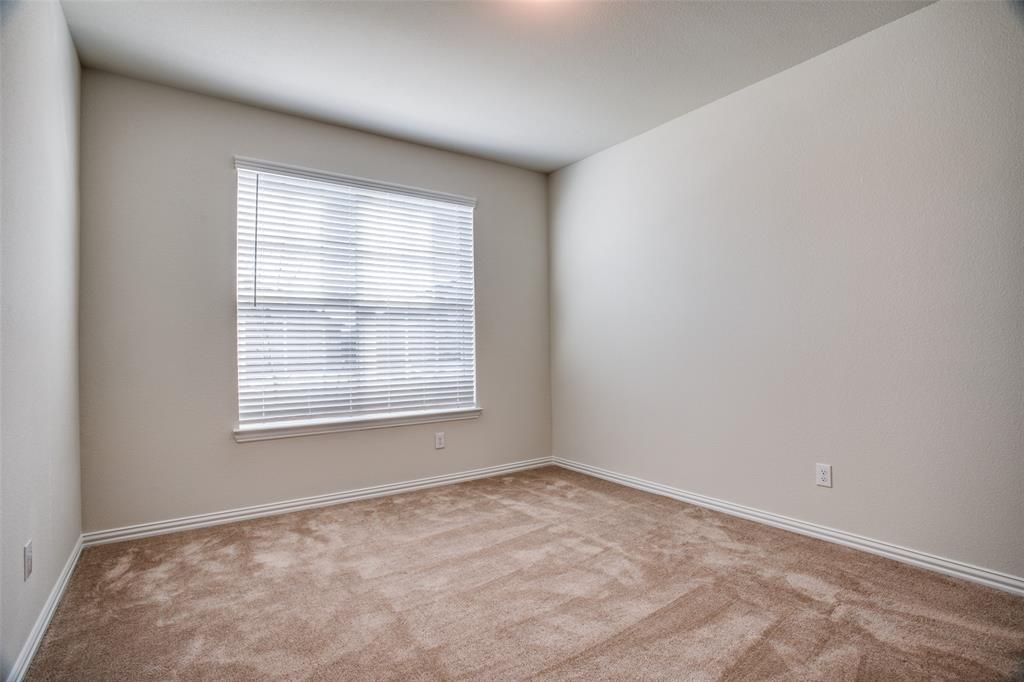 1237 Sharp Street Anna, TX 75409 - Photo 14 of 18 an empty room with a window