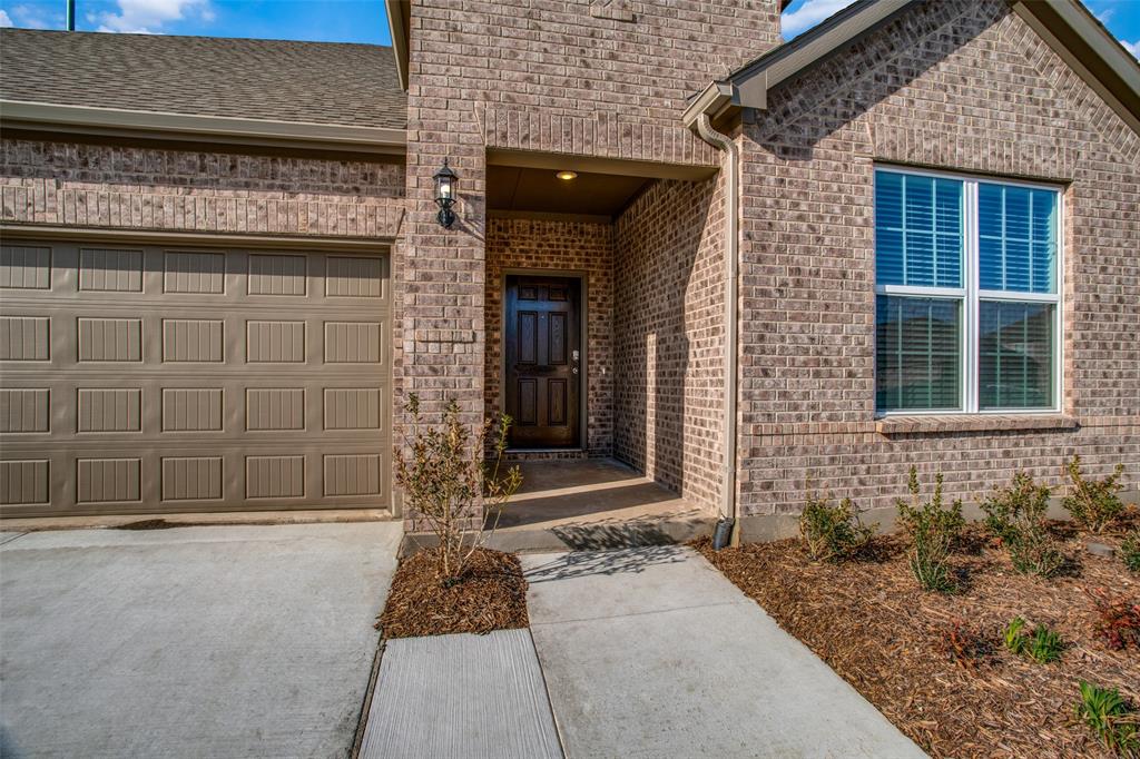 1237 Sharp Street Anna, TX 75409 - Photo 2 of 18 a front view of a house
