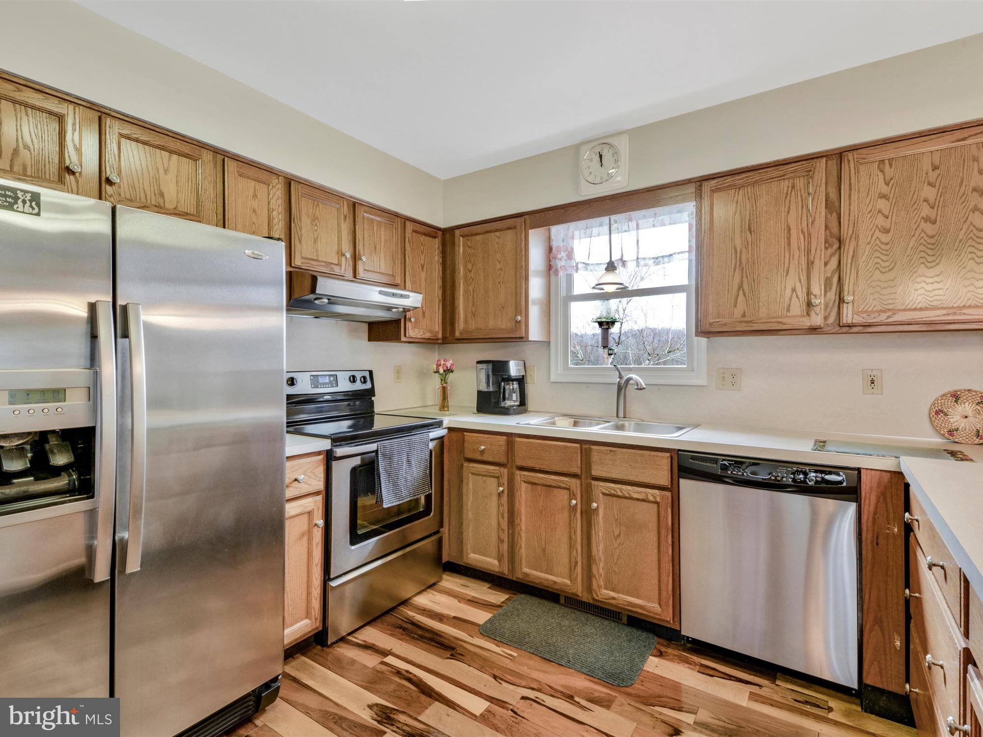 10 Barnhill Road Denver, PA 17517 - Photo 10 of 29 Kitchen with Stainless Appliances & Wood Floors