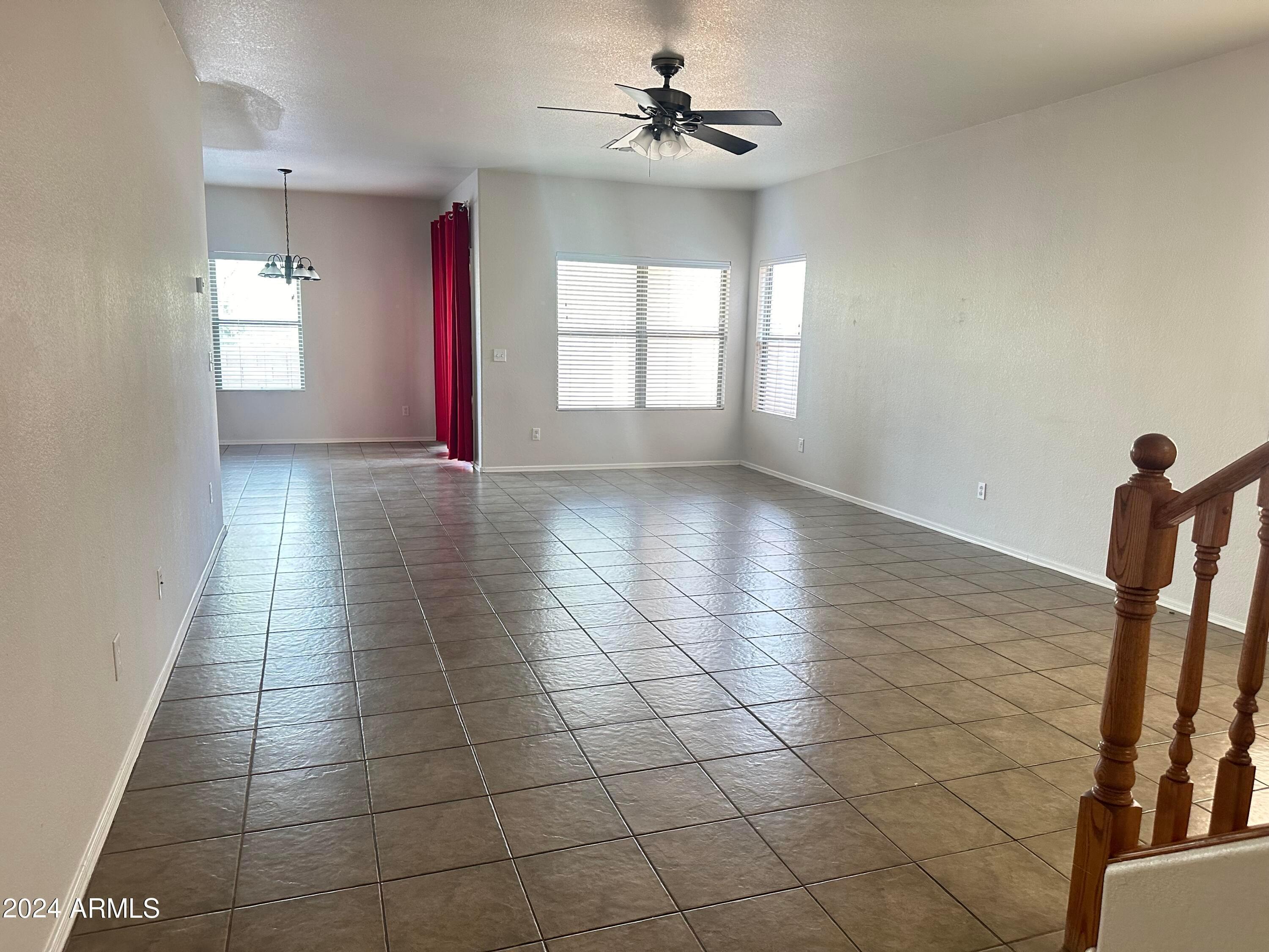 3264 South Chaparral Road Apache Junction, AZ 85119 - Photo 4 of 5 a view of an empty room with a window