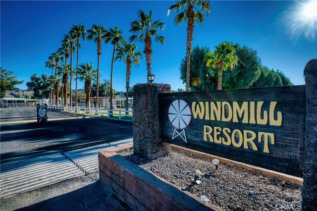 a view of a city with mountains in the background