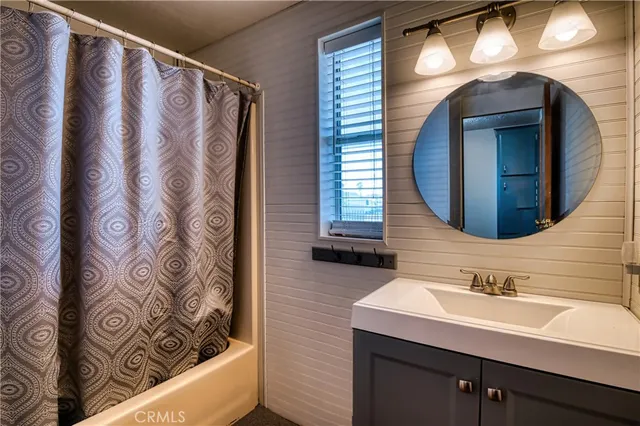 a view of a living room and a window