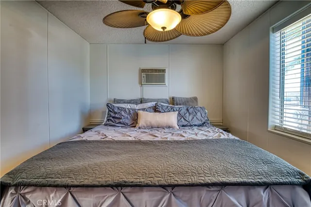 a view of a lake with couches and city view