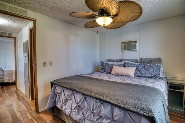 a view of a lake with tables and chairs
