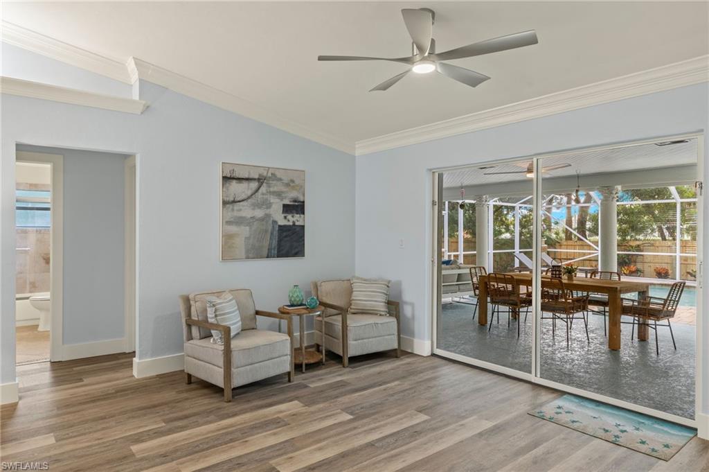 2796 Clipper Way Naples, FL 34104 - Photo 8 of 36 Living area with hardwood / wood-style floors, a wealth of natural light, and ceiling fan
