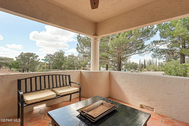 a living room with a couch and a large window