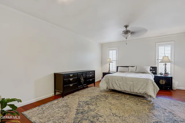 a view of a patio with a chairs and table in a patio