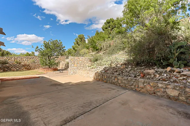 an aerial view of residential house with parking space