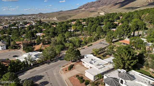 an aerial view of a house with a garden