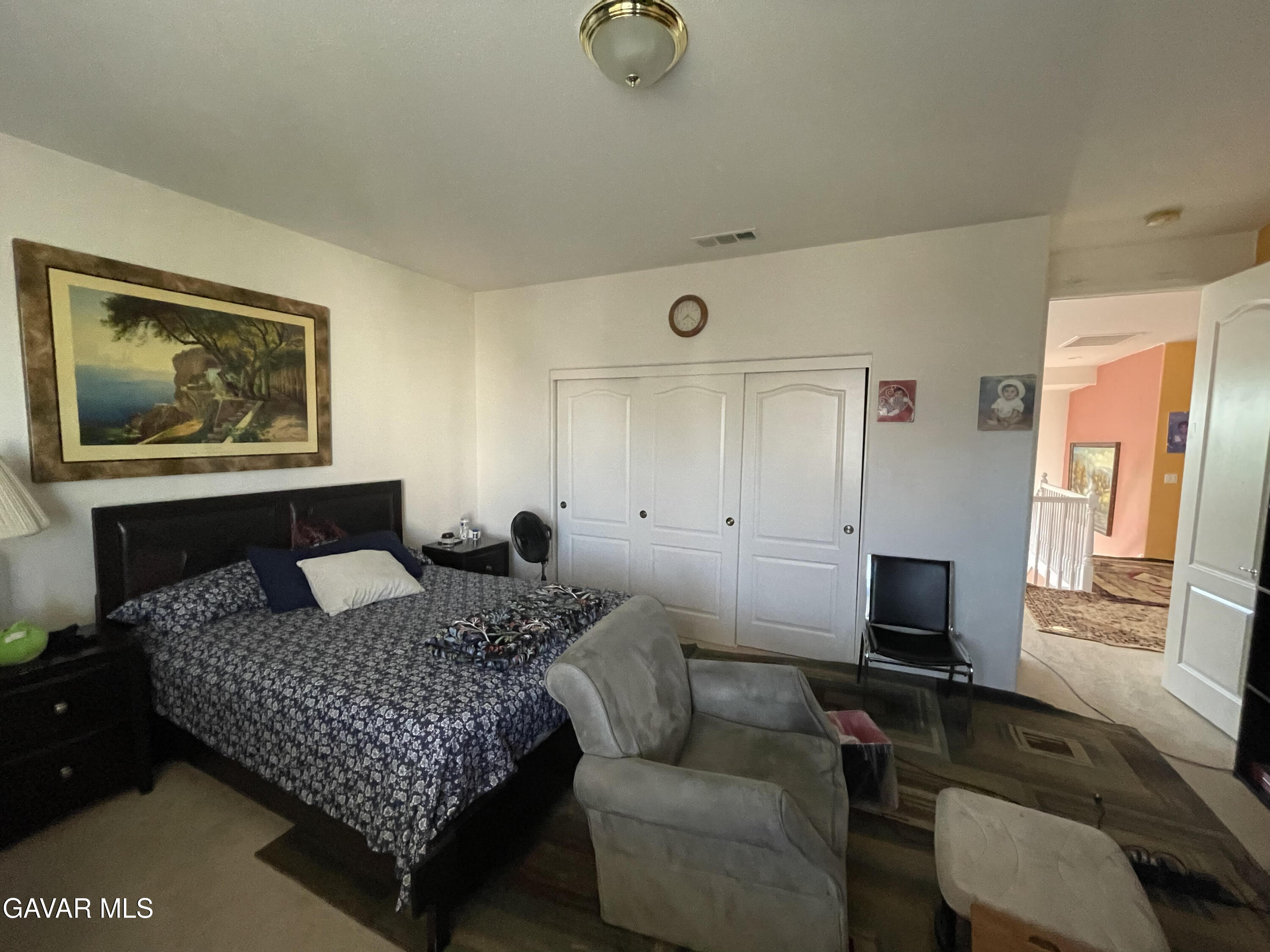 3303 Arious Way Lancaster, CA 93536 - Photo 35 of 43 a bedroom with a bed and couch