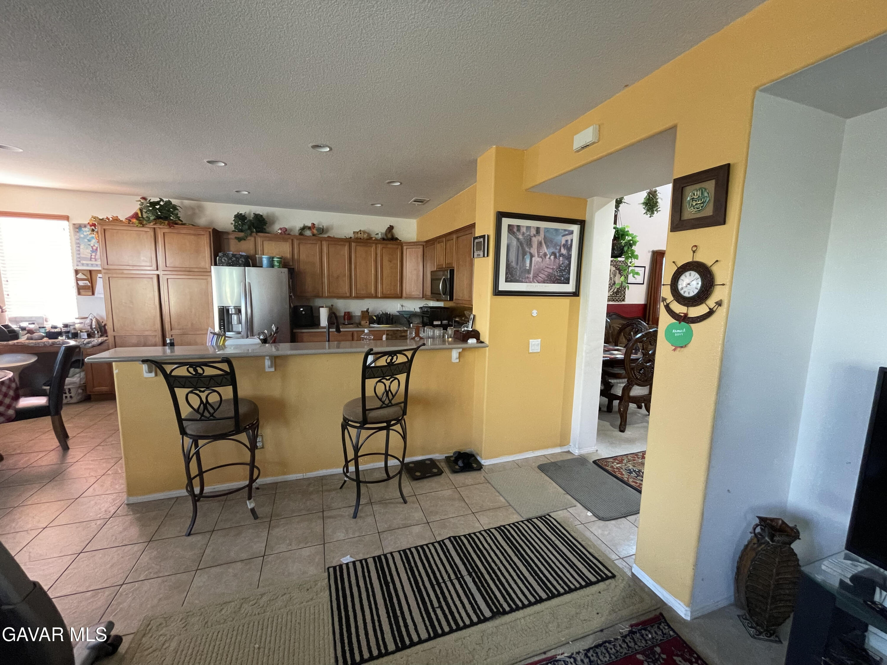3303 Arious Way Lancaster, CA 93536 - Photo 38 of 43 a view of a dining room with furniture