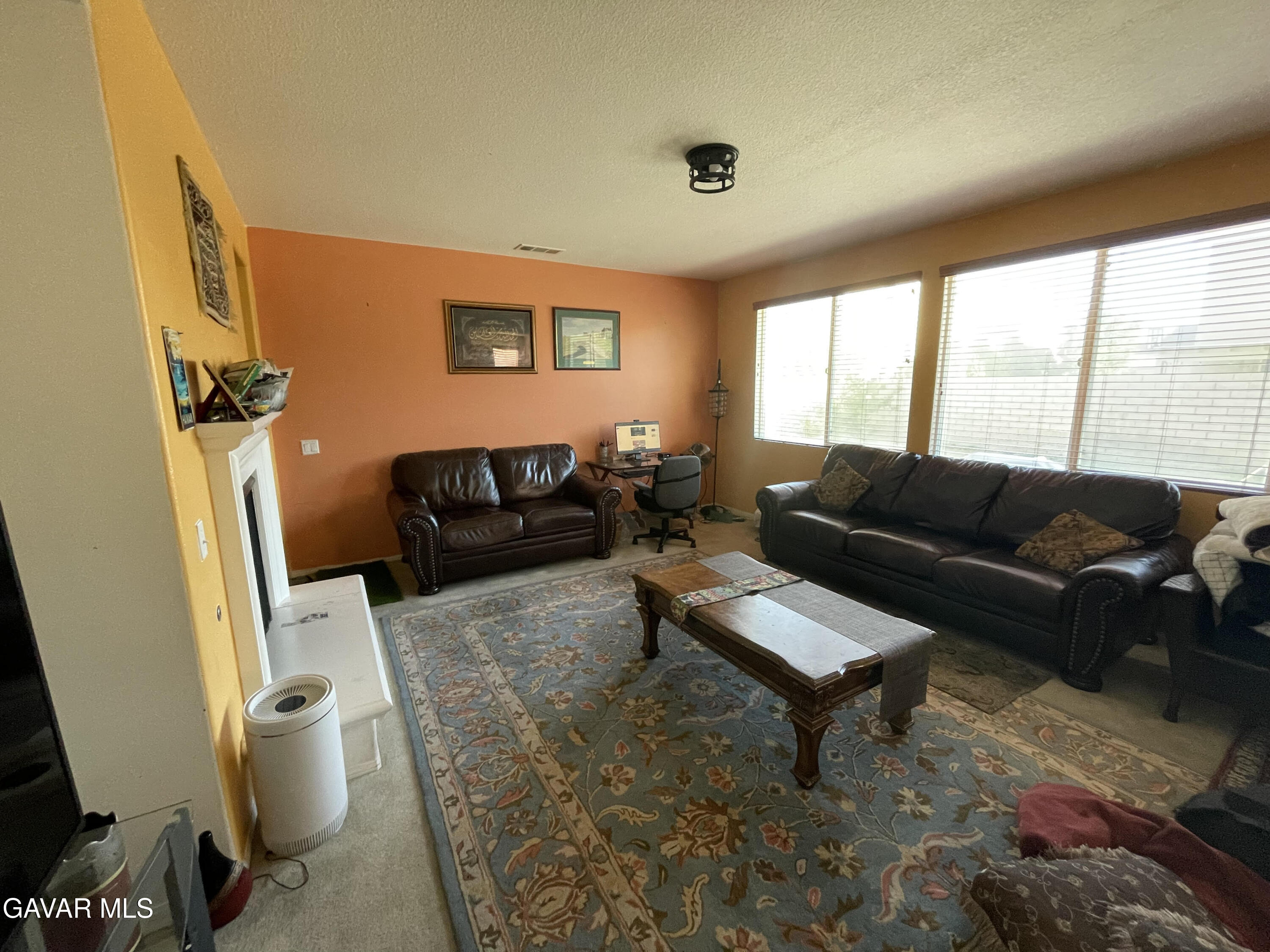 3303 Arious Way Lancaster, CA 93536 - Photo 41 of 43 a living room with furniture and a large window